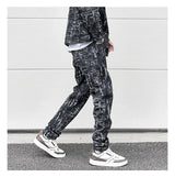 harajuku irregular scratched ripped holes denim jeans men zipper jeans hip hop streetwear new casual slim fit joggers jean pants unique joggers style 970