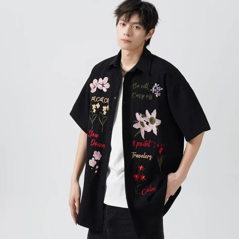 leather varsity jacket, fall winter fit, for men, fall streetwear outfit, oversized style, layered fashion, modern aesthetic, graphic detail