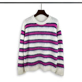 grunge knit sweater with heavyweight fabric, layered urban look for cold weather, street fashion menswear trend for seasonal 
