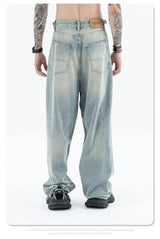 Straight Jeans with torn knees