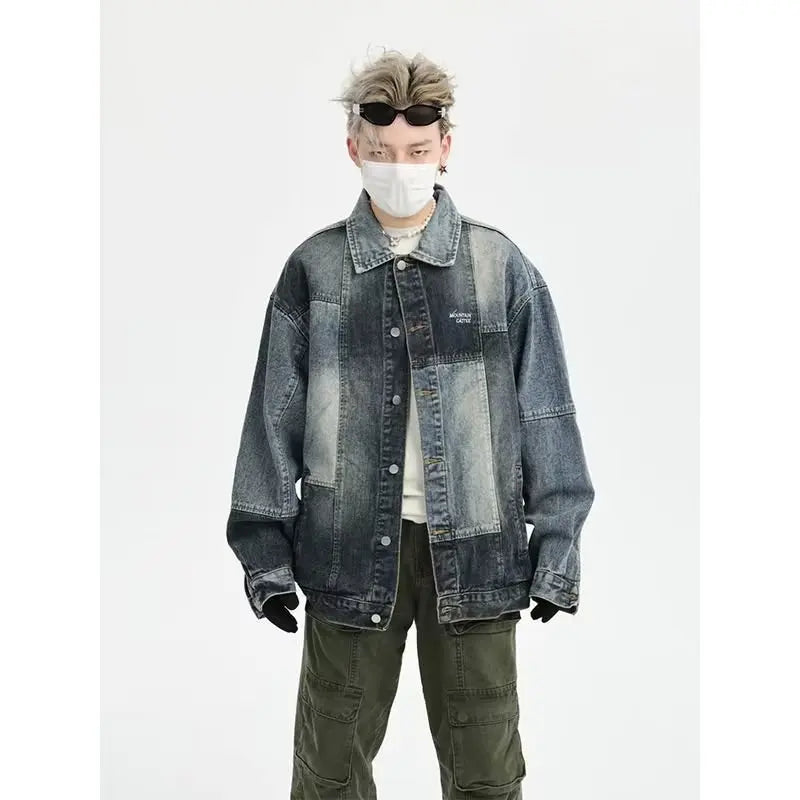 bold graphic coat, high-street look, for men, fall streetwear outfit, oversized style, layered fashion, modern aesthetic, graphic detail