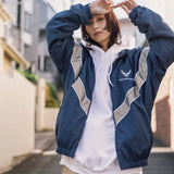 checkered varsity coat, layered streetwear look, trendy