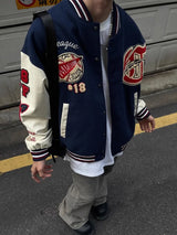 checkered varsity coat, layered streetwear look, trendy