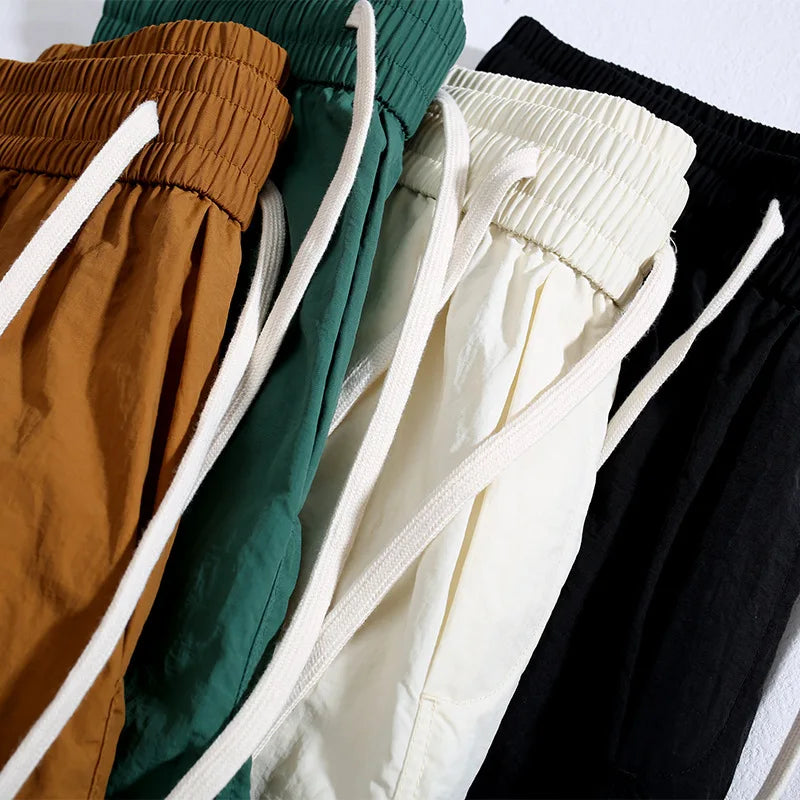 summer quick drying shorts mens loose straight casual sports pants thin breathable solid color zipper pocket cargo pants baggy cargo bottoms