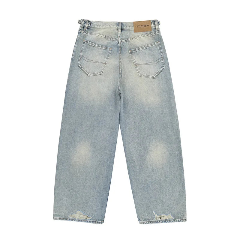 Straight Jeans with torn knees