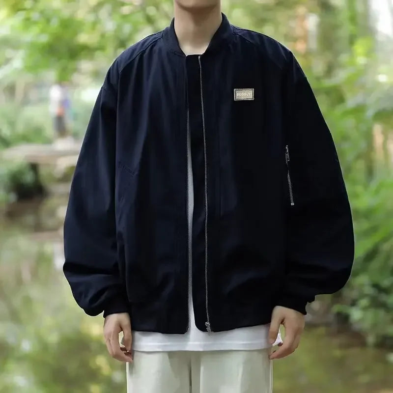 checkered varsity bomber, high-street look, men's streetwear fashion, trendy oversized fit, urban techwear design, modern hip