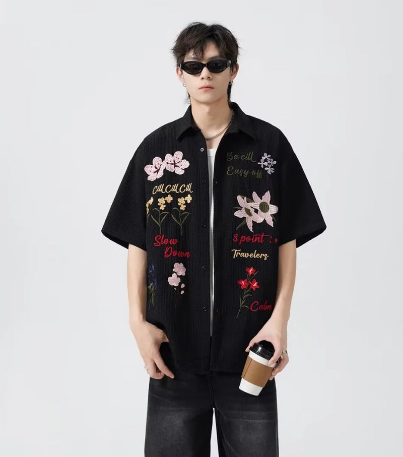 panel varsity outerwear, 2025 trend, for men, fall streetwear outfit, oversized style, layered fashion, modern aesthetic, graphic detail