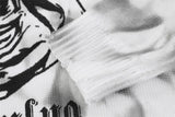 oversized flame jumper with bold print, ideal for photo-ready Y2K streetwear layering, street fashion menswear trend for seas