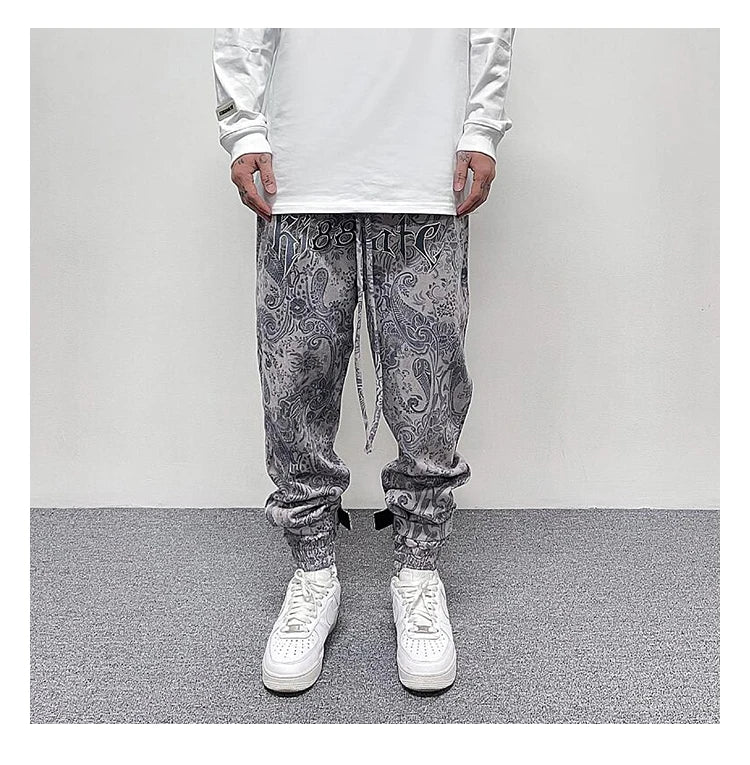 hip hop loose fit elastic waist pants fashion paisy ankle pants mens casual letter embroidery drewstring sportwear pants joggers unique joggers style 3511