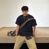 Y2K Oversized Tee – Chrome Skull Graphic with Retro Edge