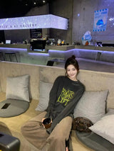 grunge pullover streetwear, modern knitwear, cozy fashion fit, stylish street outfit, modern aesthetic appeal