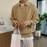 grunge knit sweater with heavyweight fabric, layered urban look for cold weather, street fashion menswear trend for seasonal 