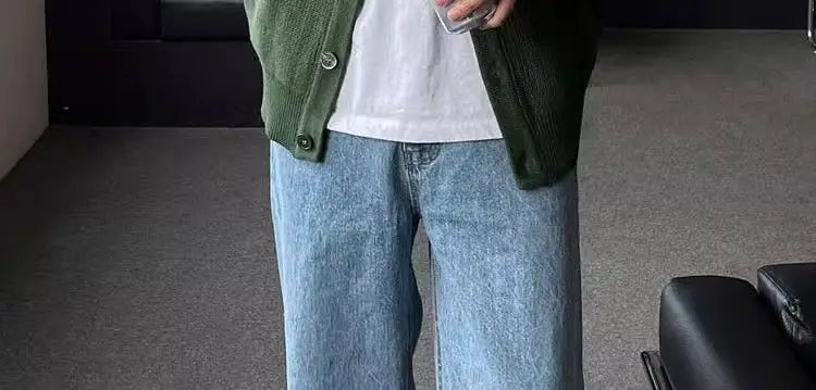 grunge knit sweater with heavyweight fabric, layered urban look for cold weather, street fashion menswear trend for seasonal 