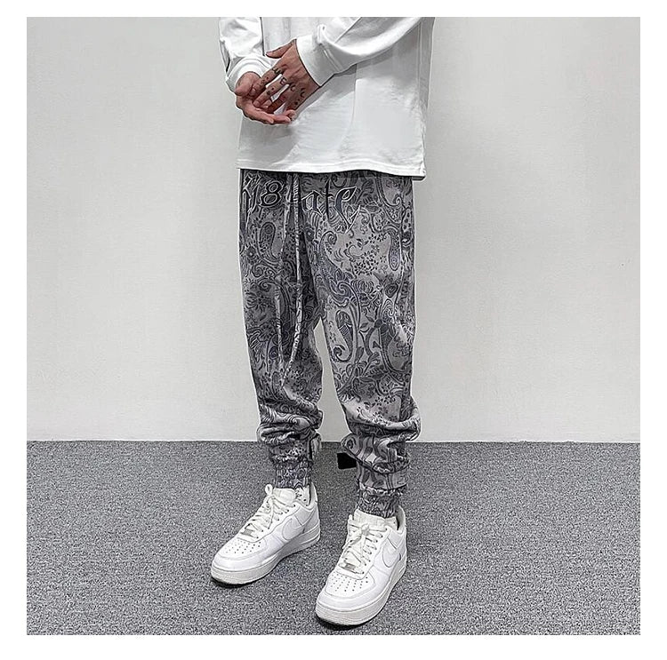 hip hop loose fit elastic waist pants fashion paisy ankle pants mens casual letter embroidery drewstring sportwear pants joggers unique joggers style 3512