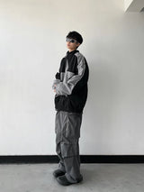 panel varsity outerwear, 2025 trend, for men, fall streetwear outfit, oversized style, layered fashion, modern aesthetic, graphic detail