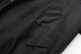 bold graphic coat, high-street look, for men, fall streetwear outfit, oversized style, layered fashion, modern aesthetic, graphic detail