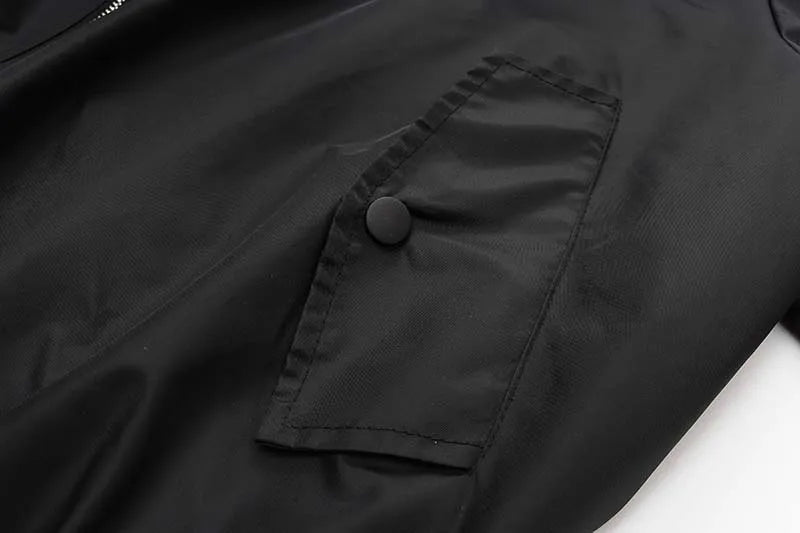 bold graphic coat, high-street look, for men, fall streetwear outfit, oversized style, layered fashion, modern aesthetic, graphic detail