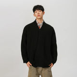 varsity graphic knit, unisex street look, trendy streetwear apparel for men and women