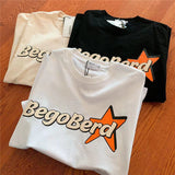 Y2K Graphic Tee – American Cute Orange Star Letters Cartoon T Shirt Vintage St – Modern Streetwear for Everyone