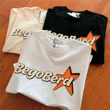 Y2K Graphic Tee – American Cute Orange Star Letters Cartoon T Shirt Vintage St – Modern Streetwear for Everyone