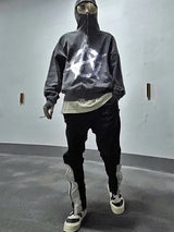 Baggy skater hoodie with distressed 90s graphics