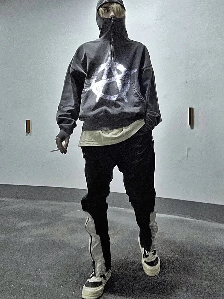 Baggy skater hoodie with distressed 90s graphics