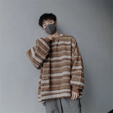 oversized flame jumper, 2025 fashion trend, fire knit jumper in oversized streetwear fashion