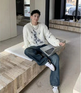 bold graphic pullover, layered streetwear look, soft knit pullover with flame design, y2k fashion statement