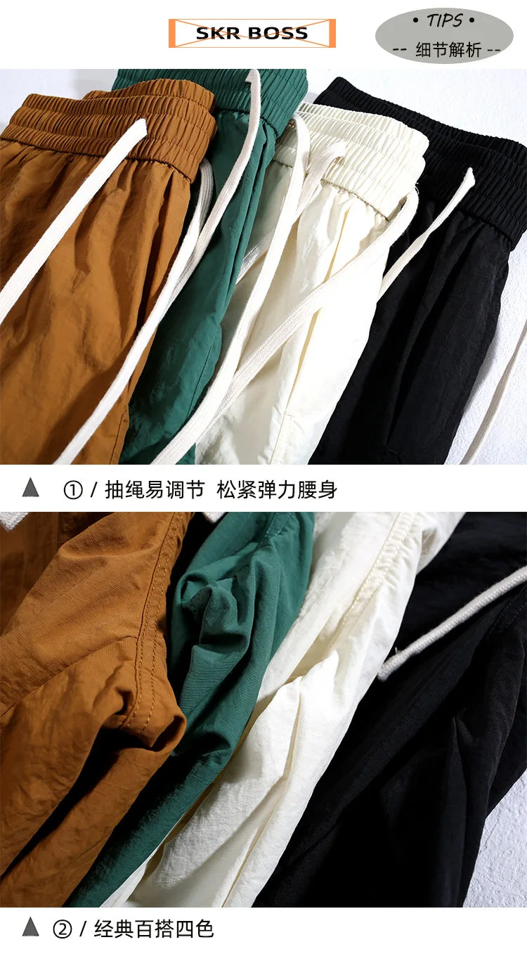 summer quick drying shorts mens loose straight casual sports pants thin breathable solid color zipper pocket cargo pants unique cargo style 945