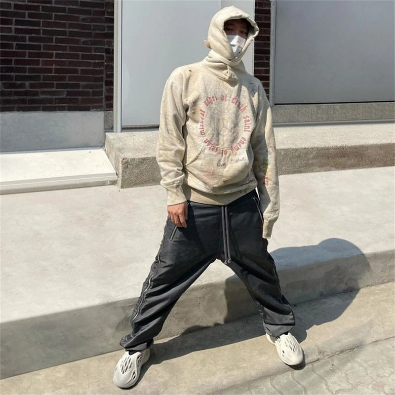 Cyberpunk hacker hoodie with matrix-inspired code graphics