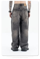 Splashing ink to wash old baggy retro jeans