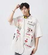 bold graphic coat, high-street look, for men, fall streetwear outfit, oversized style, layered fashion, modern aesthetic, graphic detail