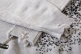 grunge knit sweater with heavyweight fabric, layered urban look for cold weather, street fashion menswear trend for seasonal 