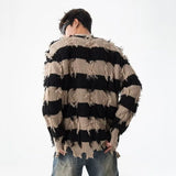 bold graphic pullover, layered streetwear look, soft knit pullover with flame design, y2k fashion statement