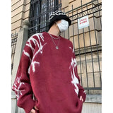 oversized knit pullover, fall/winter fashion, soft knit pullover with flame design, y2k fashion statement