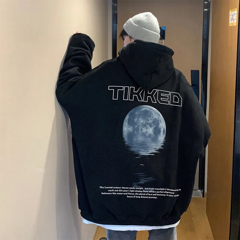 Futuristic techwear hoodie with holographic elements
