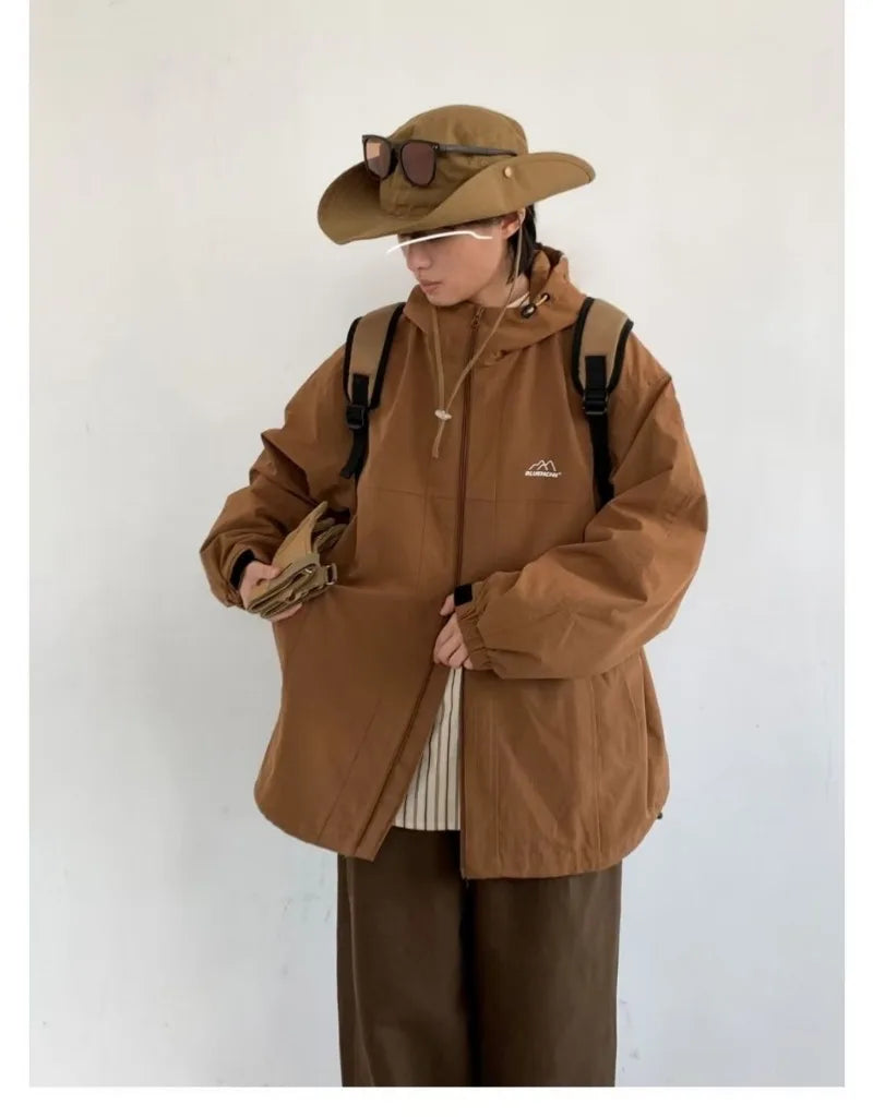graphic winter jacket, 2025 streetwear trend, cool weather