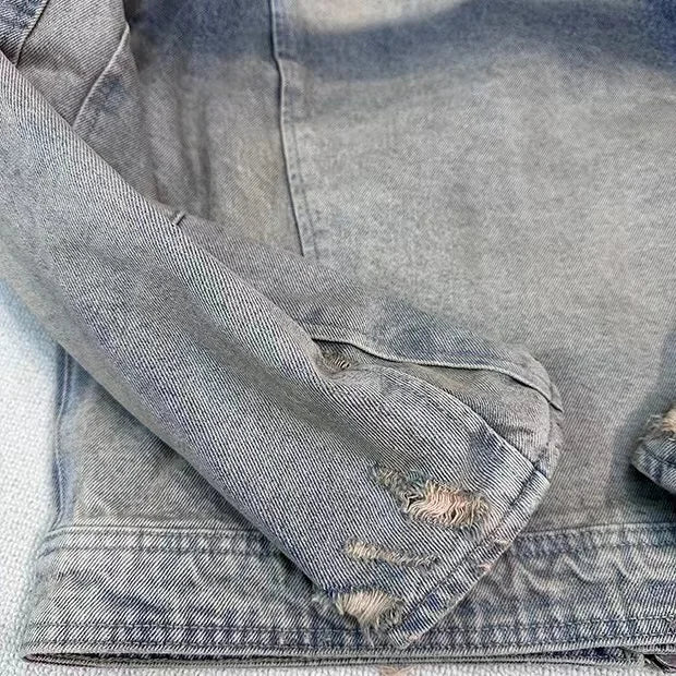menswear fashion piece featuring collarless wash denim motorcycle jacket design – premium quality jacket for men
