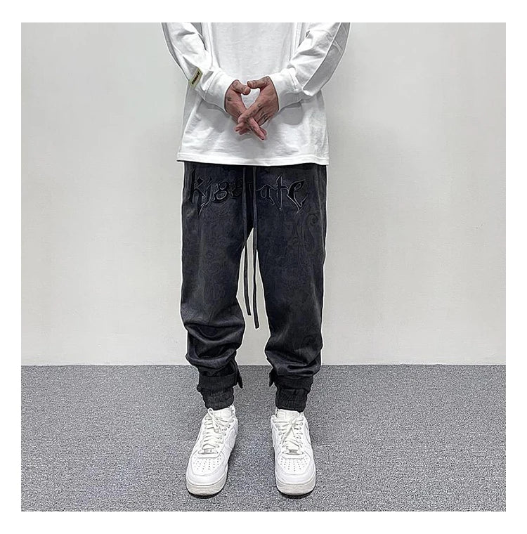 hip hop loose fit elastic waist pants fashion paisy ankle pants mens casual letter embroidery drewstring sportwear pants joggers unique joggers style 3523