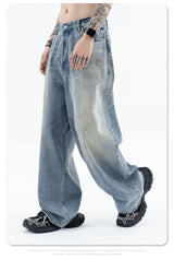 Splashing ink to wash old baggy retro jeans