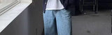 oversized flame jumper with bold print, ideal for photo-ready Y2K streetwear layering, street fashion menswear trend for seas