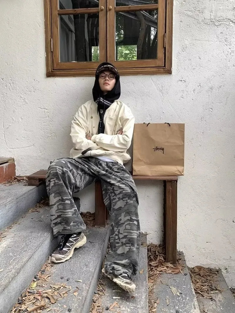 panel varsity outerwear, 2025 trend, for men, fall streetwear outfit, oversized style, layered fashion, modern aesthetic, graphic detail