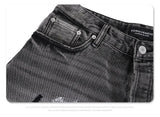Splashing ink to wash old baggy retro jeans
