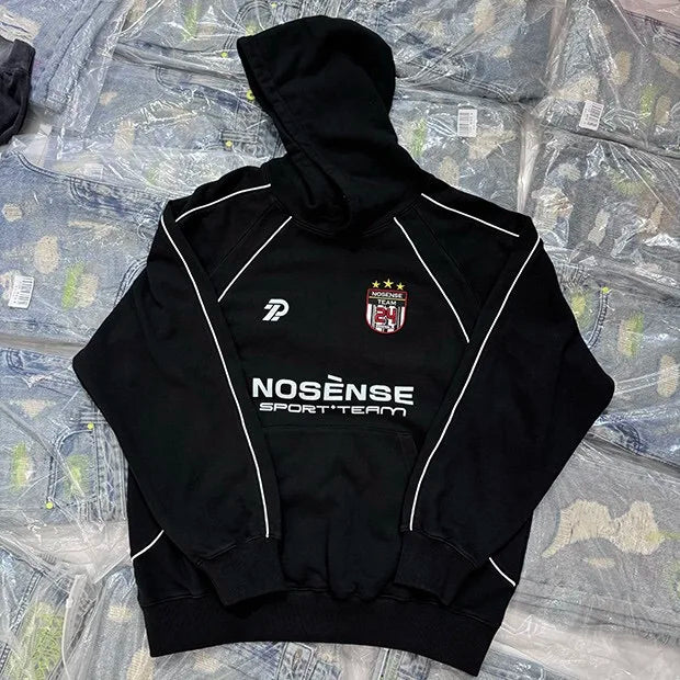 2000s streetwear hoodie with futuristic neon typography