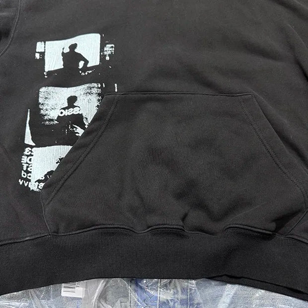 Heavy metal-inspired hoodie with distressed grunge art