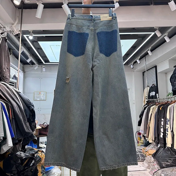 Cut Jeans with a mud-dye knife
