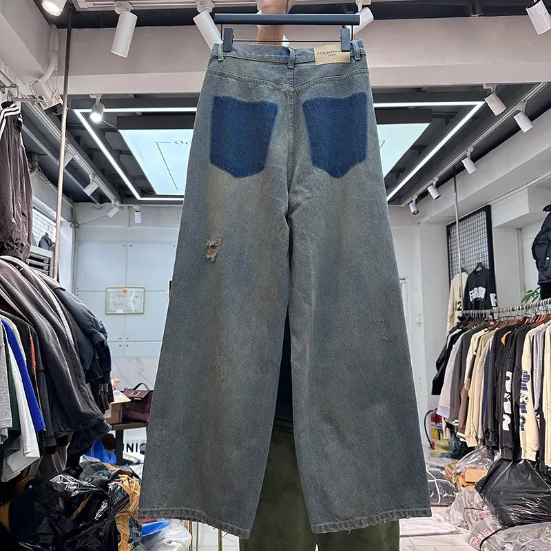 Cut Jeans with a mud-dye knife