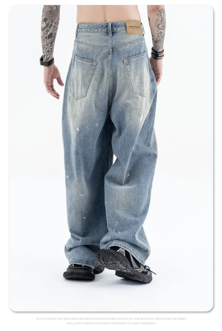 Splashing ink to wash old baggy retro jeans