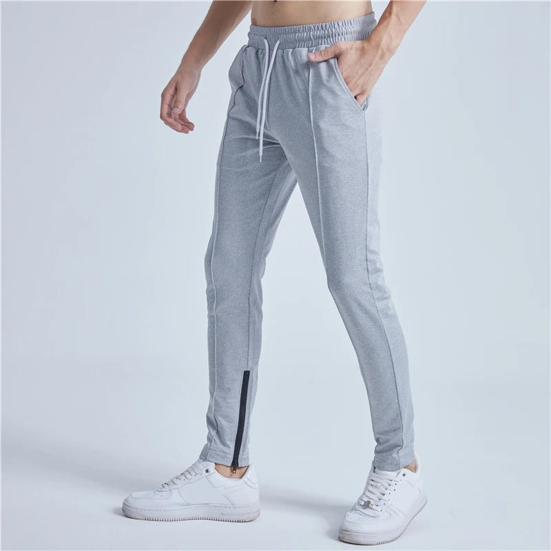 rainbowtouches new thin casual pants men fashion slim fit solid color brand trousers sweatpants elastic men workout pant unique joggers style 1021