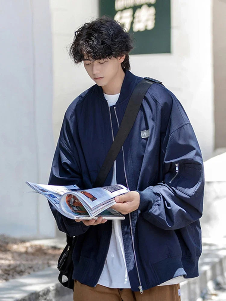 checkered varsity bomber, high-street look, men's streetwear fashion, trendy oversized fit, urban techwear design, modern hip